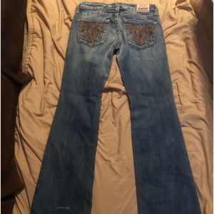 Big Star Casey fit with brown decor back pockets. Size 28 R cotton and elastin